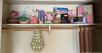 Entire shelf with Easter baskets, dye kits, gift bags, novelty kit