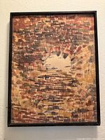 Front view of framed abstract painting