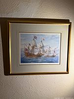 Full view of framed print on wall