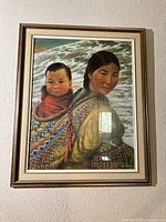 Framed artwork on wall showing full view