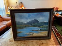 Framed landscape oil painting front view