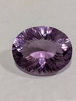 Top view of faceted oval amethyst