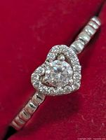 Top view showing heart halo with round center CZ