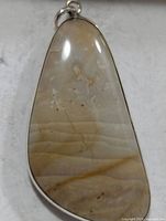 Front view of silver moonstone pendant