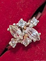 cluster of clear stones on silver ring