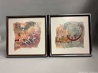 Both framed prints side by side