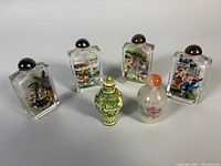 group of six snuff bottles showing front views