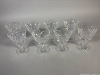 Group of eight cut crystal sherry glasses