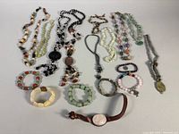 Group shot of all necklaces and bracelets laid out