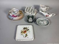 Group shot of all eight porcelain and jasperware pieces