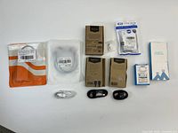 Overall view of all packaged cables and adapters on white background