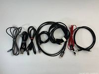All seven cables laid out to show quantity and length differences