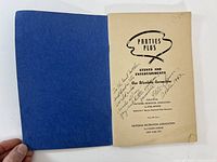 Front interior title page showing booklet title, publisher, handwritten note