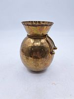Front view hammered brass vase with rope band