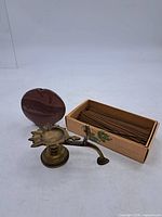 Brass lamp, ceramic burner, incense box grouped together