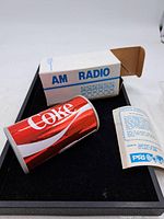 Radio, box and warranty sheet overview