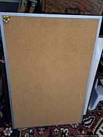 Full view of cork bulletin board with aluminum frame