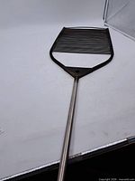 Full view of long-handled grill grate