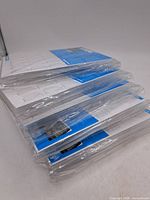 Stack of four sealed Leuchtturm ENCAP SLAB sheet packs