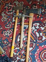 Overview of all three handled tools on rug