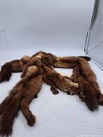 Full view of joined-pelt mink stole on white backdrop