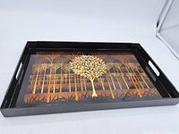 Top view showing gold tree design and handles