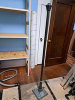 Full view of metal torchère floor lamp