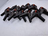 All ten clamps arranged on surface