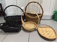 Group shot showing all five baskets of various shapes, colors and handles