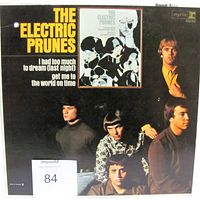 Front cover showing title, band photo, and Reprise logo