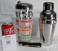 Group shot showing both shakers, corkscrew, coke can for scale