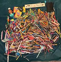 Full lot overview showing large pile of pencils, markers, crayons and accessories