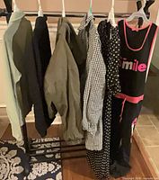 All six garments on rack