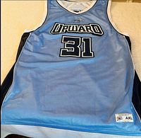 Front light blue side showing Upward logo and #31