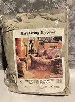 Front view of packaged Easy Living slipcover showing branding and product details