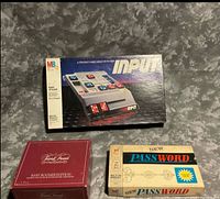 All three game boxes: Input, Trivial Pursuit Baby Boomer Edition, two New Password boxes visible