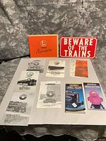 Overhead view showing catalog, sign, manuals, price guides