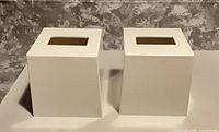 Two white square melamine tissue box covers side by side front view