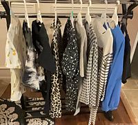 Rack with all ten assorted women’s T-shirts