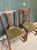 pair of wooden side chairs full view