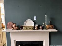 Overall mantel view with all items for context