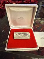 Obverse of Franklin Mint sterling silver Christmas ingot in case