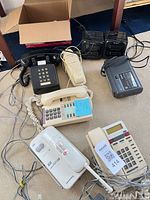 Group shot of all phones, answering machines and recorder with cabling
