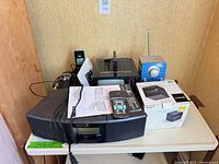 Group shot of all electronic items on table