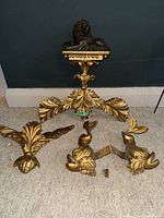 overview of all gilded pieces and black bust bracket