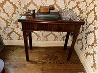 Front view of rectangular wooden side table