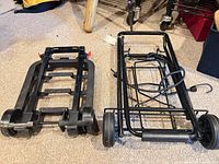 Both carts folded side by side showing overall design and wheels