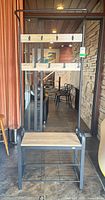 Front view of VivoHome hall tree showing hooks, bench, shoe rack
