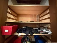 Overview of shelf with hats and gloves