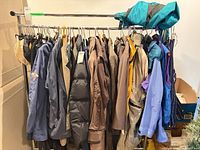 Rack with multiple women’s coats and jackets of various colours and styles